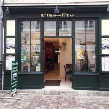 L’Insolite - Cover